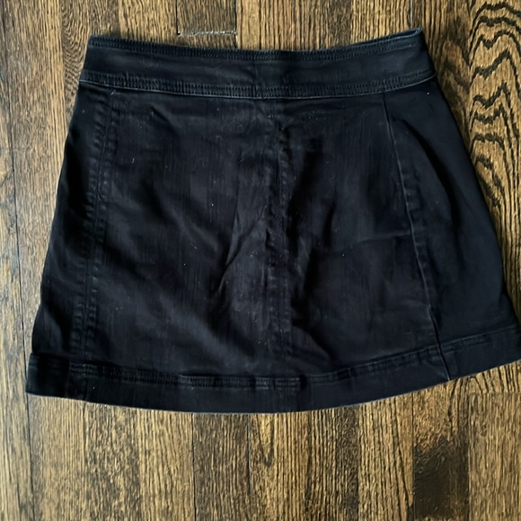 3/$15 Free People black denim mini skirt with snaps - Picture 2 of 4